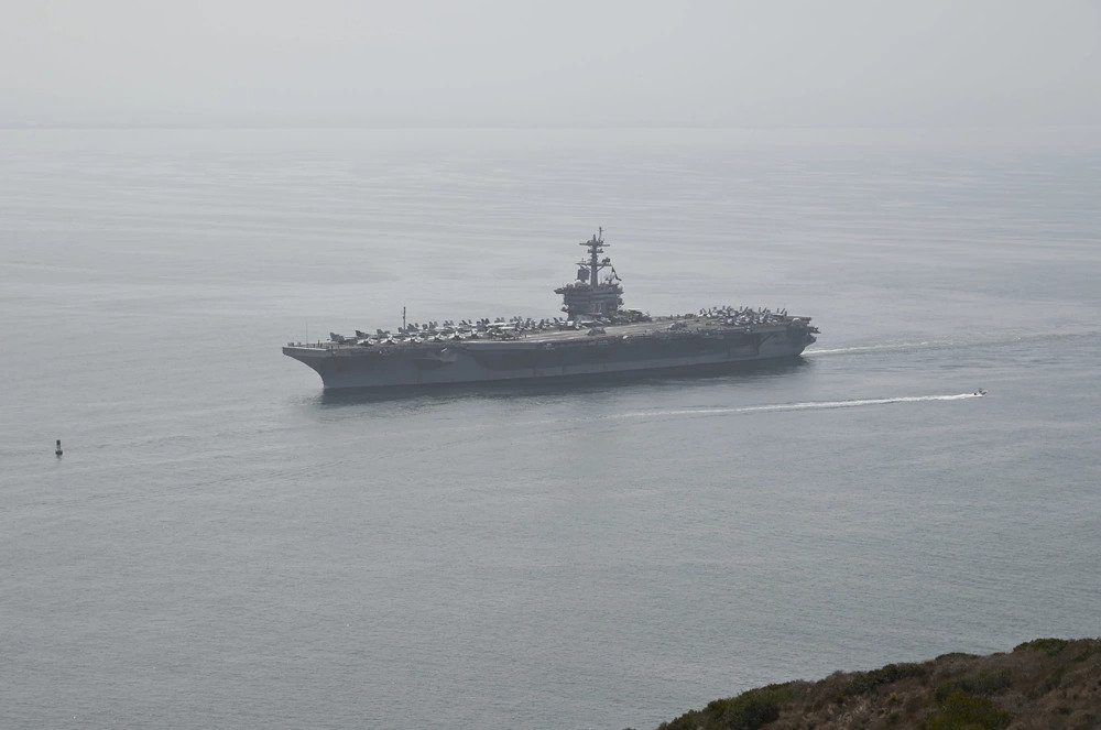 Aircraft carrier USS Abraham Lincoln (CVN 72) returns to its homeport of Naval Air Station North Island. Lincoln returned upon completion of a scheduled underway in the U.S. 3rd Fleet area of operations. (DVIDS, U.S. Navy photo by Chief Mass Communication Specialist Rosa Paschall). Source: https://www.dvidshub.net/image/6747814/uss-abraham-lincoln-cvn-72-returns