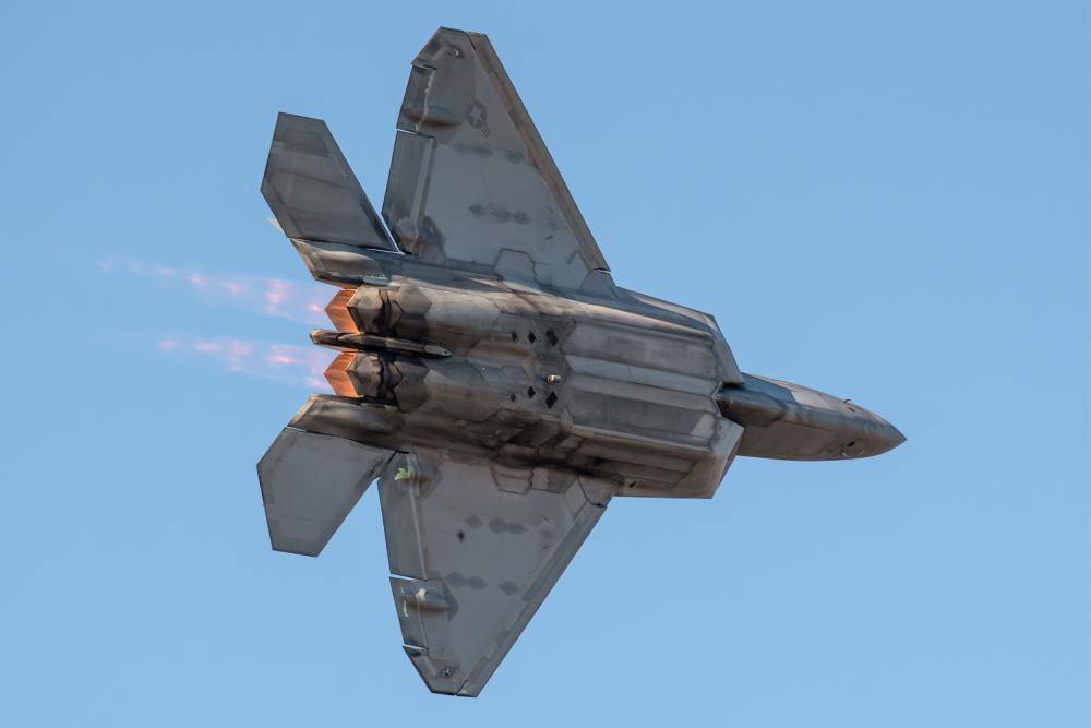 The U.S. Air Force F-22 Raptor Demo Team from the 1st Fighter Wing at Langley Air Force Base, Va., performs an aerial demonstration over the Ohio River in downtown Louisville, Ky., April 23, 2022 as part of the Thunder Over Louisville air show. This year’s event celebrated the 75th anniversary of the United States Air Force. (U.S. Air National Guard photo by Dale Greer). Source: https://www.dvidshub.net/image/7160335/thunder-air-show-honors-air-force-75th-anniversary