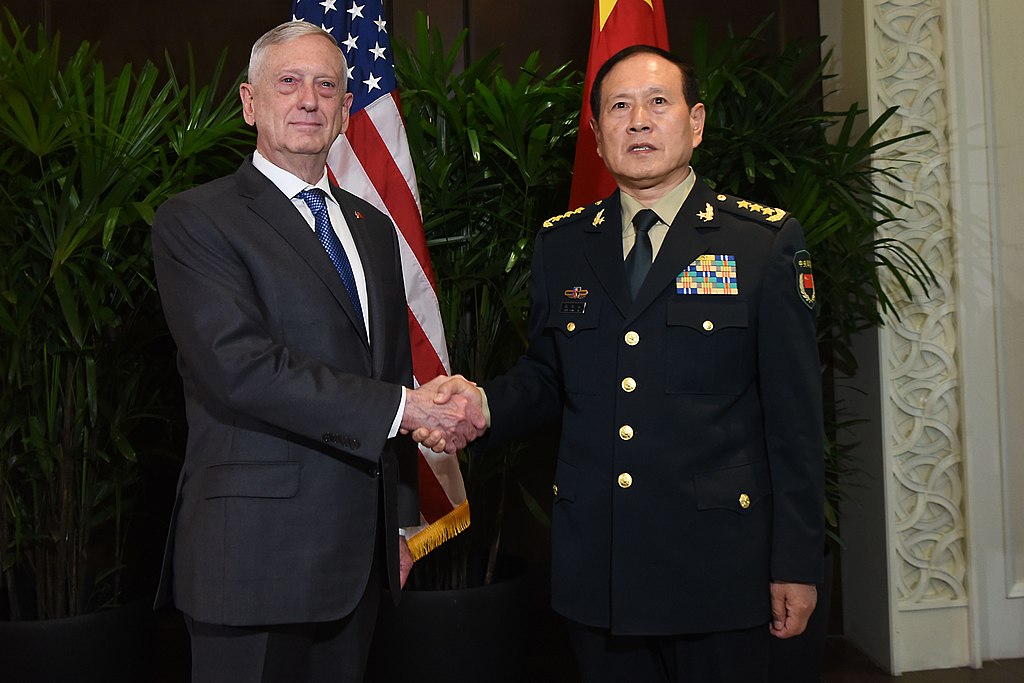 Former U.S. Secretary of Defense James N. Mattis meets with China's Minister of National Defence Gen. Wei Fenghe at the ASEAN Defense Ministers’ Meeting, Singapore, Oct. 18, 2018. (James N. Mattis, CC BY 2.0 <https://creativecommons.org/licenses/by/2.0>, via Wikimedia Commons).