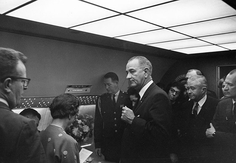 Officials gather inside Air Force One for the swearing-in of President Lyndon B. Johnson at Love Field in Dallas, Texas, following the assassination of President John F. Kennedy.