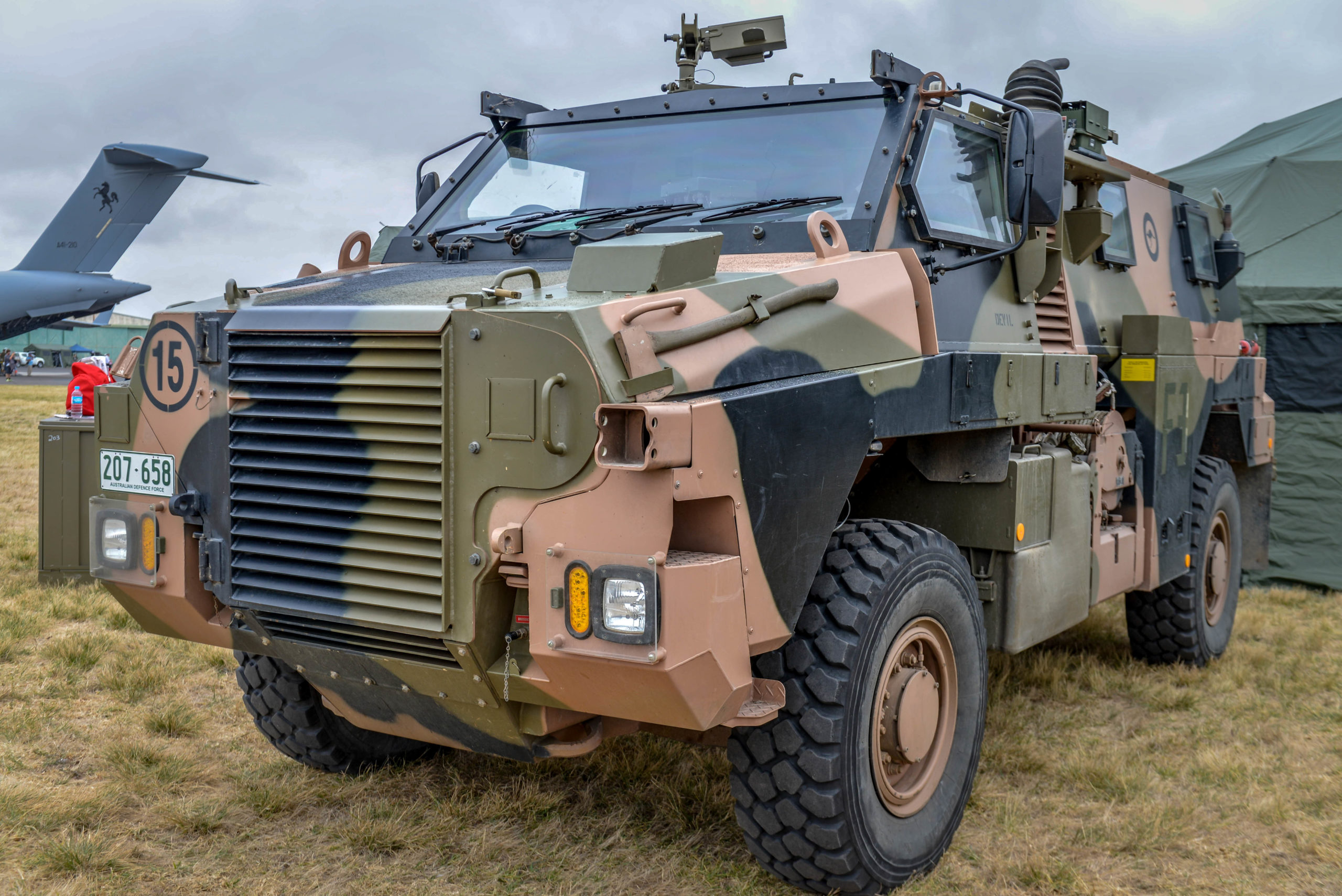 Bushmaster Protected Mobility Vehicle on display at Centenary of Military Aviation 2014 (Hpeterswald, CC BY-SA 3.0, via Wikimedia Commons). Source: https://commons.wikimedia.org/wiki/File:Bushmaster_Protected_Mobility_Vehicle_on_display_at_Centenary_of_Military_Aviation_2014.jpg