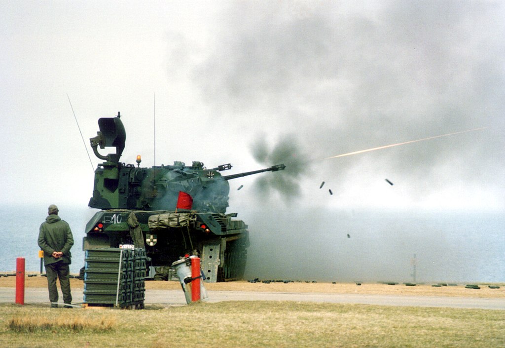 Gepard Anti-Aircraft Tank shooting a target in Hohwacht Bay (Derwatz, CC BY-SA 3.0 <http://creativecommons.org/licenses/by-sa/3.0/>, via Wikimedia Commons). Source: https://commons.wikimedia.org/wiki/File:FLAK-Panzer_Gepard_%C3%9Cbungsschie%C3%9Fen_Todendorf_1987.jpg