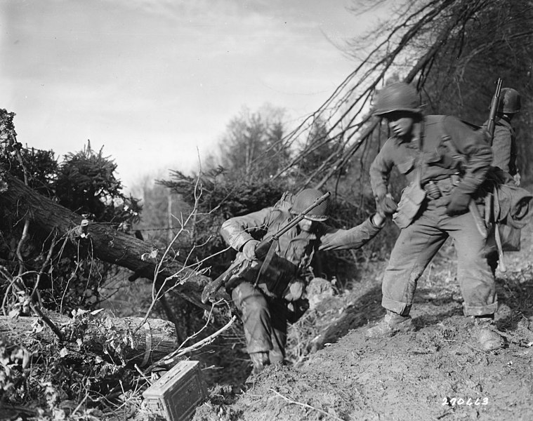 Private First Class Benny Barrow Helps a Buddy in the Hurtgen Forest, Germany