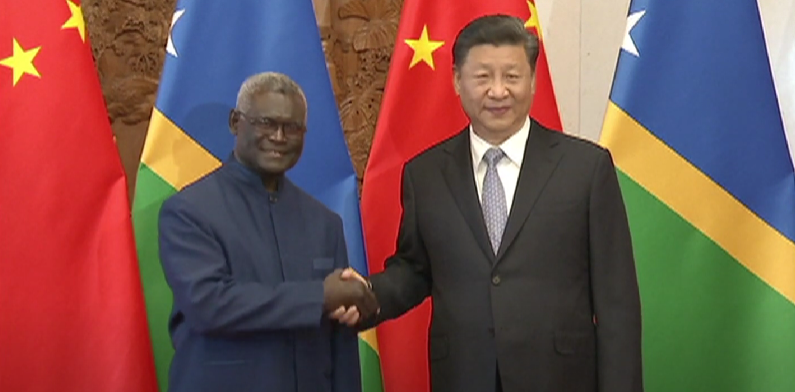 Solomon Islands Prime Minister Manasseh Sogavare and Chinese President Xi Jinping in 2019 (Screenshot from CCTV Video News Agency). Source: https://www.youtube.com/watch?v=GtcYVPBgBfo