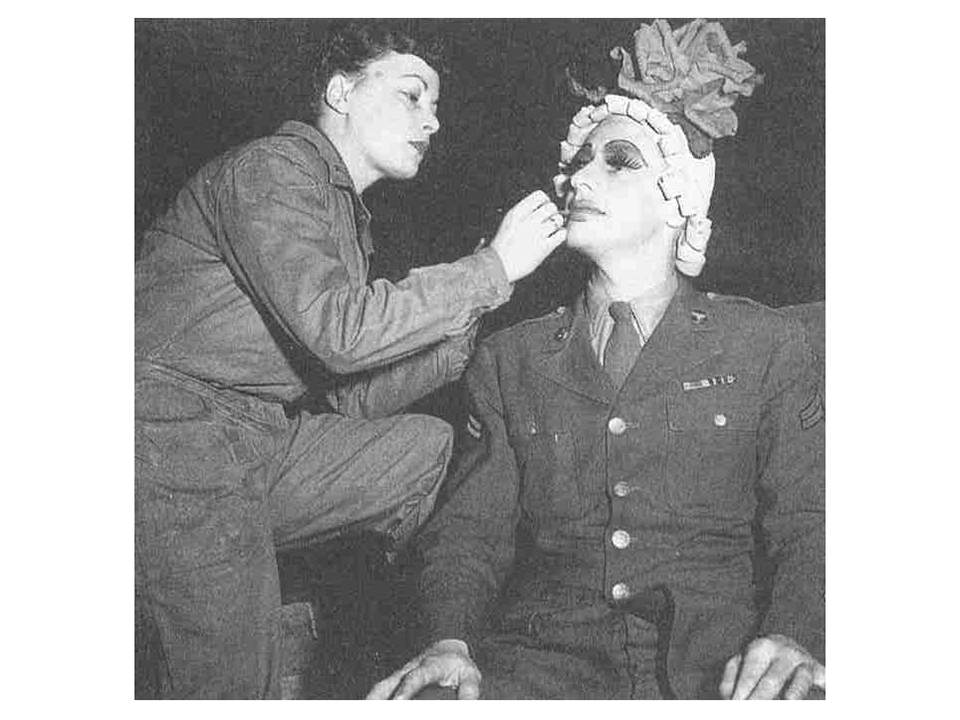 Wac applying makeup to GI. Army Signal Corps photographs, SC-204637, courtesy of the National Archives.