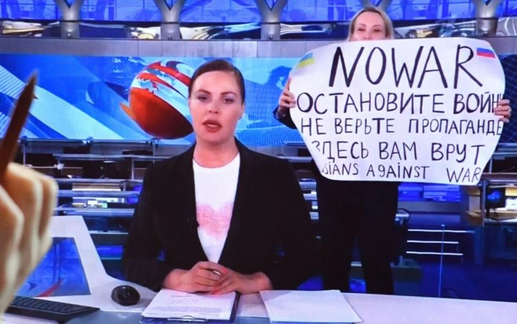 Defiant Russian News Editor, Marina Ovsyannikova, Gives Middle Finger to Russian Censorship