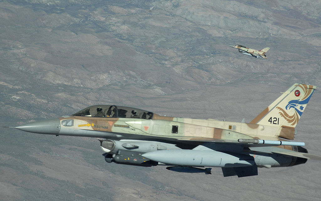 A two-ship of Israeli Air Force F-16s from Ramon Air Base, Israel, head out to the Nevada Test and Training Range, July 17 during Red Flag Exercise 09-4 (Master Sergeant Kevin J. Gruenwald, Public domain, via Wikimedia Commons). Source: https://commons.wikimedia.org/wiki/File:Israeli_F-16s_at_Red_Flag.jpg