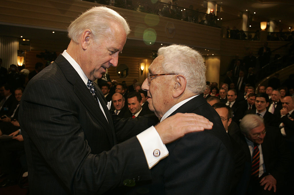 Then Vice President and now President Biden and Dr. Henry Kissinger during th 45th Munich Security Conference 2009 (Kai Mörk, CC BY 3.0 DE , via Wikimedia Commons).