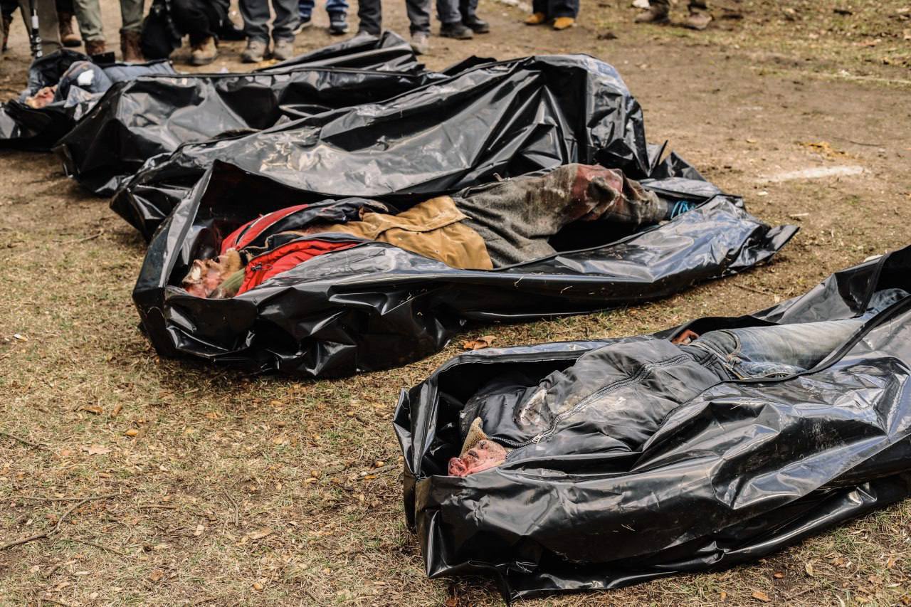 Bodies being pulled out from one of the torture chambers found in Bucha, Ukraine (Oleksiy Sorokin). Source: https://twitter.com/mrsorokaa/status/1511095801950445575