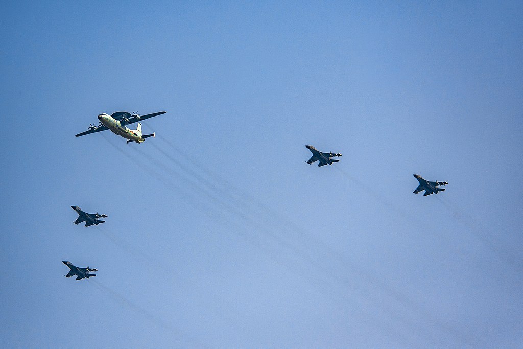A KJ-500 and 4 J-11Bs from the Chinese Armed Forces (N509FZ, CC BY-SA 4.0 , via Wikimedia Commons). Source: https://commons.wikimedia.org/wiki/File:KJ-500_and_J-11B_at_PRC70_Parade_(20191001112437).jpg