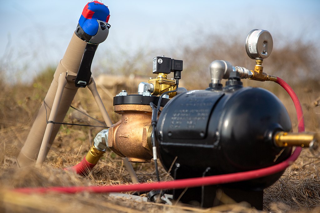 A lethal miniature aerial missile system is prepared for launch during an exercise with 1st Air Naval Gunfire Liaison Company (ANGLICO), I Marine Expeditionary Force Information Group, at Marine Corps Base Camp Pendleton, California, Sept. 2, 2020. During the exercise, 1st ANGLICO’s mission was to launch, locate, track, lock and engage a simulated enemy target with an unmanned aerial system (U.S. Marine Corps/Lance Cpl. Tyler Forti, Public domain, via Wikimedia Commons). Source: https://commons.wikimedia.org/wiki/File:Switchblade_300_unit.jpg
