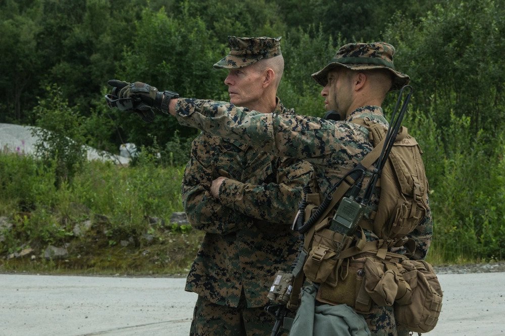 A U.S. Marine with Marine Rotational Force-Europe 20.2, Marine Forces Europe and Africa, shows Maj. Gen. Stephen M. Neary, Marine Forces Europe and Africa commander, the combat operations center (COC) in Setermoen, Norway, Aug. 5, 2020. Maj. Gen. Neary visited Marines with Marine Rotational Force-Europe for the first time after taking command July 8. MRF-E focuses on regional engagements throughout Europe by conducting various exercises, arctic cold-weather and mountain-warfare training, and military-to-military engagements, which enhance overall interoperability of the U.S. Marine Corps with allies and partners. (U.S. Marine Corps photo by Lance Cpl. Skylar M. Harris). Source: https://www.dvidshub.net/image/6303349/mfea-cg-visits-setermoen