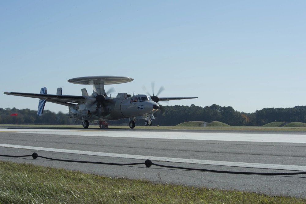 An E-2D Advanced Hawkeye, assigned to Carrier Airborne Early Warning Squadron (VAW) 121, the "Bluetails”, launches from the runway on Naval Station Norfolk during its inaugural test with the squadron. The E-2D Advanced Hawkeye is the U.S. Navy's latest variant of the E-2 Hawkeye advanced warning aircraft. (U.S. Navy photo by Mass Communication Specialist 3rd Class Shane A. Jackson/Released). Source: https://www.dvidshub.net/image/1671336/e-2d-advanced-hawkeye-launch