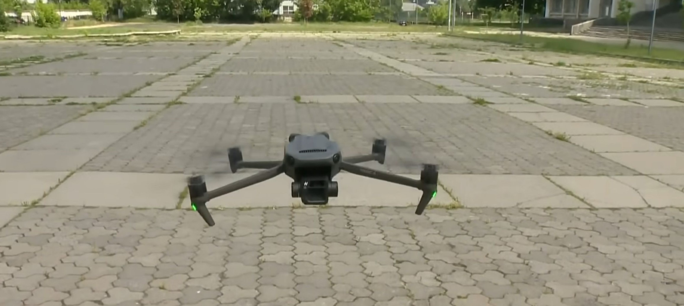 Close up image of a small drone in a hover