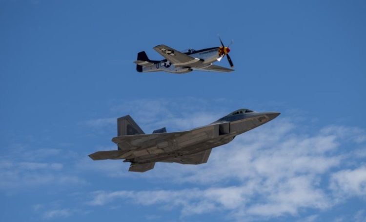 The Pic of the Day: P-51D Mustang and F-22 Raptor Fly Together During Marine Corps Air Show