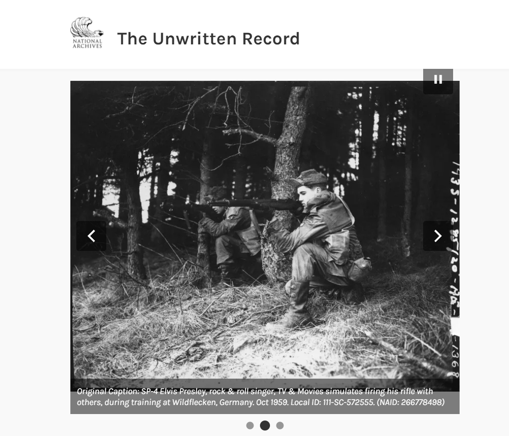 simulates firing his rifle