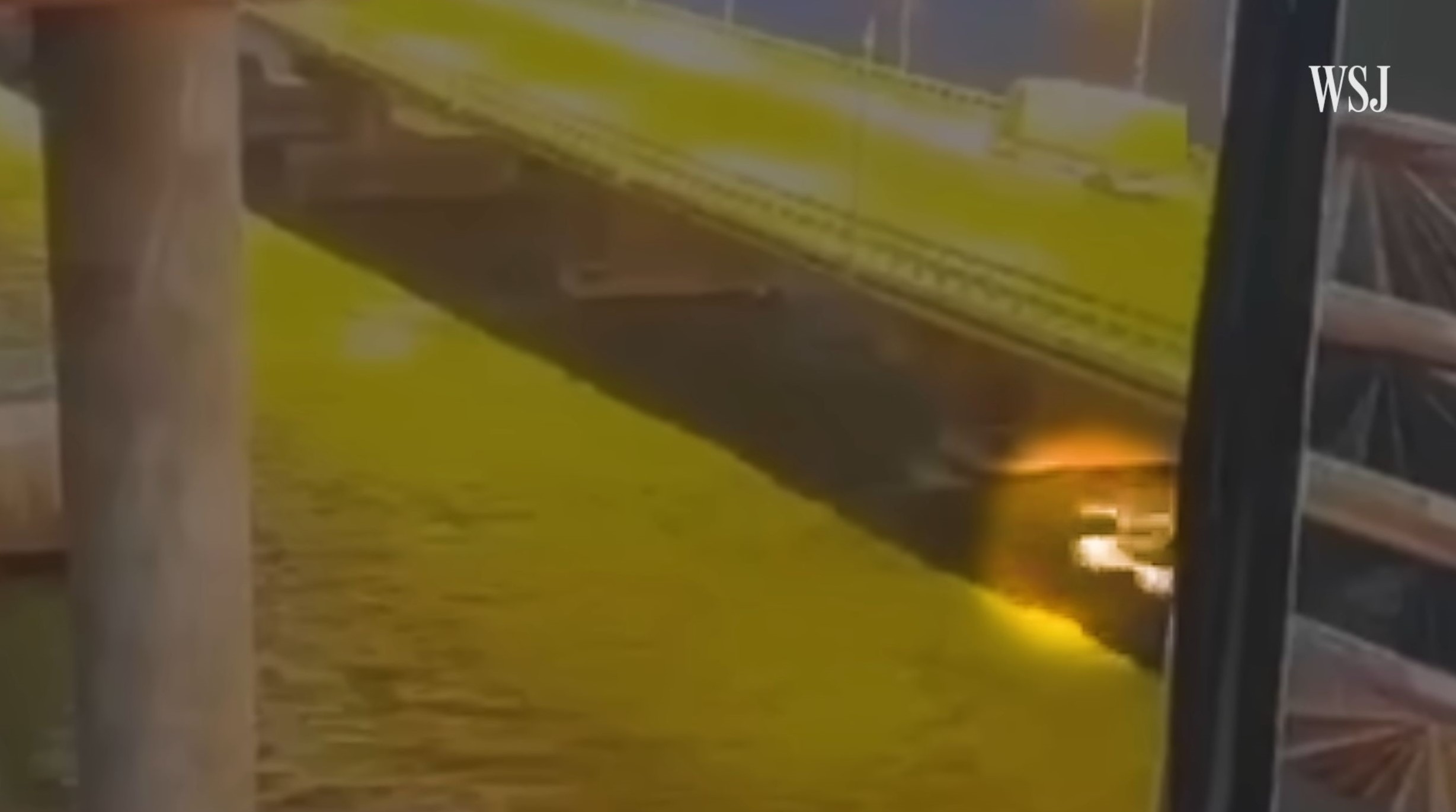 a waterborne object is below the bridge immediately before the explosion