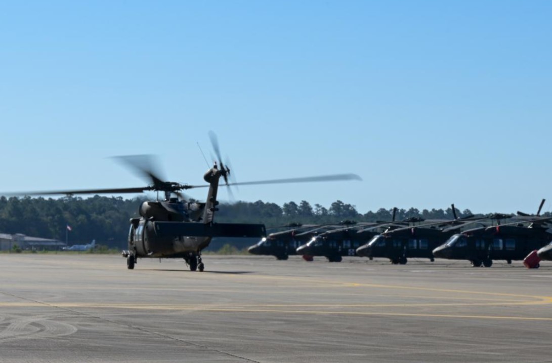 A UH-60 Black Hawk helicopter departs a Louisiana Army National Guard Aviation Support Facility to assist with Hurricane Ian emergency response efforts, Hammond, Louisiana, Sept. 28, 2022. In accordance with the guidelines of the Emergency Management Assistance Compact (EMAC) process and at the request of the Florida Department of Emergency Management, the LANG is deploying personnel and equipment to support the Florida National Guard in their response to the hurricane. (U.S. Army National Guard photo by Staff Sgt. Garrett Dipuma)