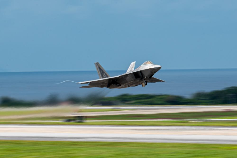 A U.S. Air Force F-22A Raptor assigned to the 3rd Wing takes off during a capabilities demonstration on Kadena Air Base, Japan, Nov. 22, 2022. Kadena’s ability to rapidly generate U.S. airpower is a vital function of its mission to ensure the stability and security of the Indo-Pacific region. (U.S. Air Force photo by Airman 1st Class Sebastian Romawac)