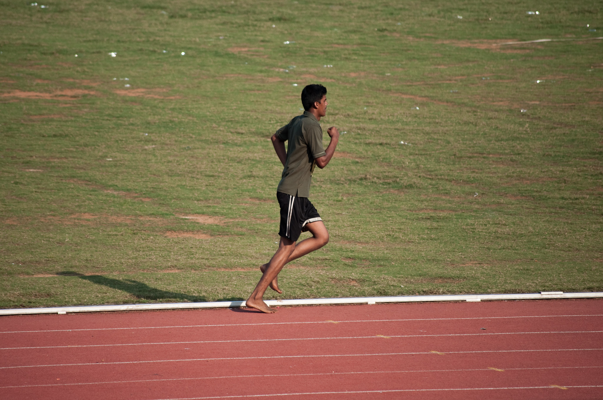 Running barefoot deals on track