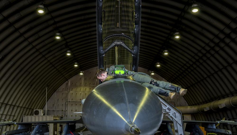 U.S. Air Force Capt. Trevor Schmidt, 36th Fighter Squadron (FS) pilot, performs pre-flight checks on an F-16 Fighting Falcon before a training mission at Osan Air Base, Republic of Korea, Dec. 28, 2022. The 36th FS regularly conducts training missions to increase readiness and enable pilots to utilize strategies to increase their lethality in combat situations. (U.S. Air Force photo by Staff Sgt. Dwane R. Young)