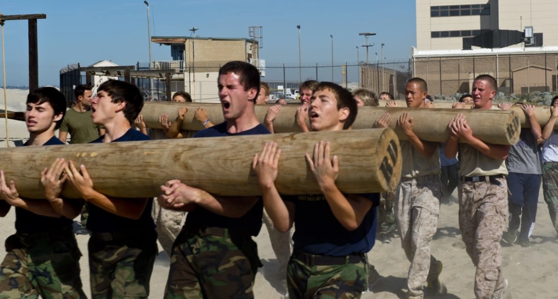 San Diego-area high school students participate in log physical training during the third annual Navy SEAL Invitational hosted by the Navy SEAL & SWCC Scout Team. The Scout Team provides mental and physical training for different athletic teams with the goal of creating awareness for careers in Naval Special Warfare. (U.S. Navy photo by Mass Communication Specialist Seaman Apprentice Conor Minto/Released)