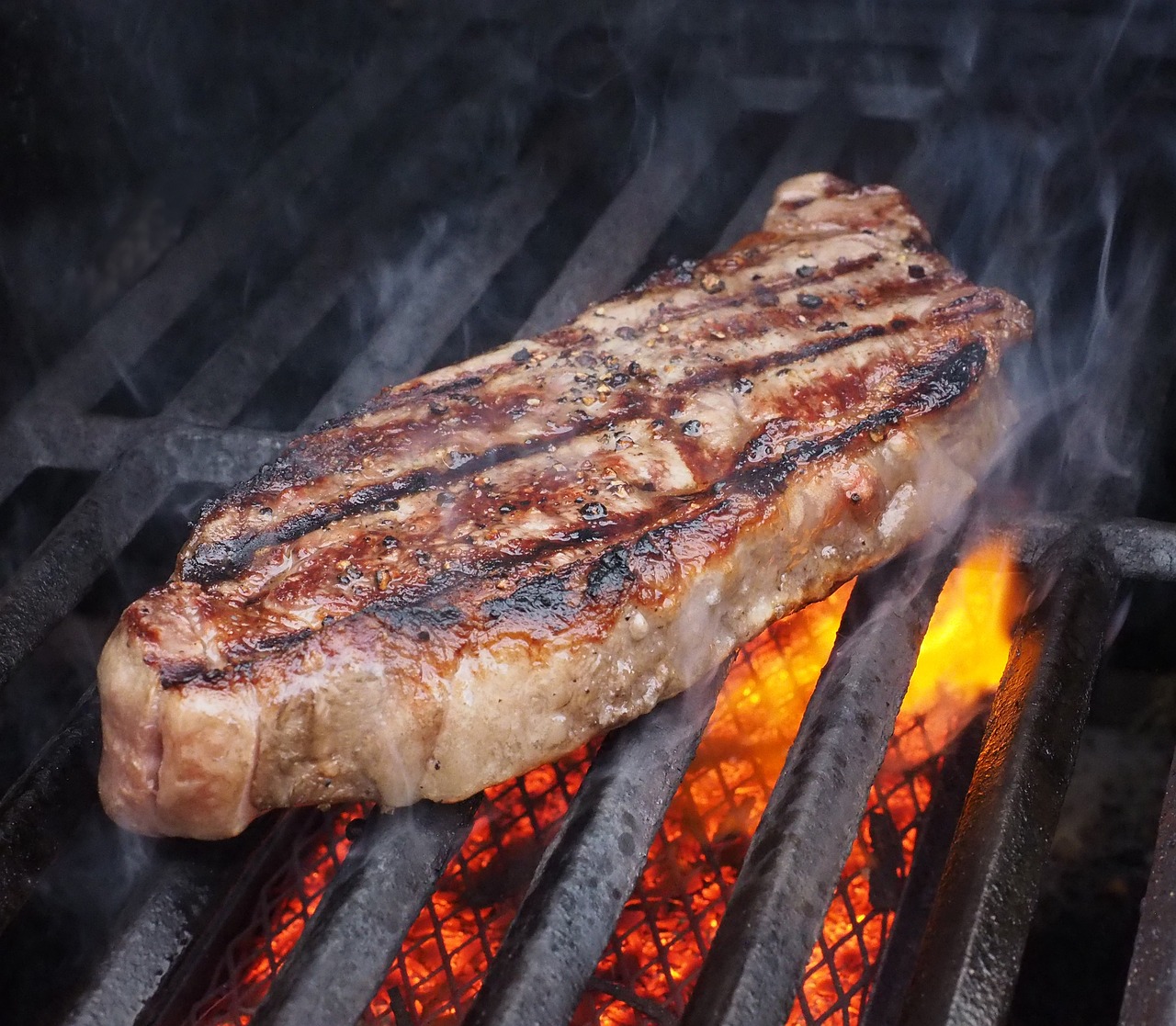 This is how to cook steak over fire the right way.