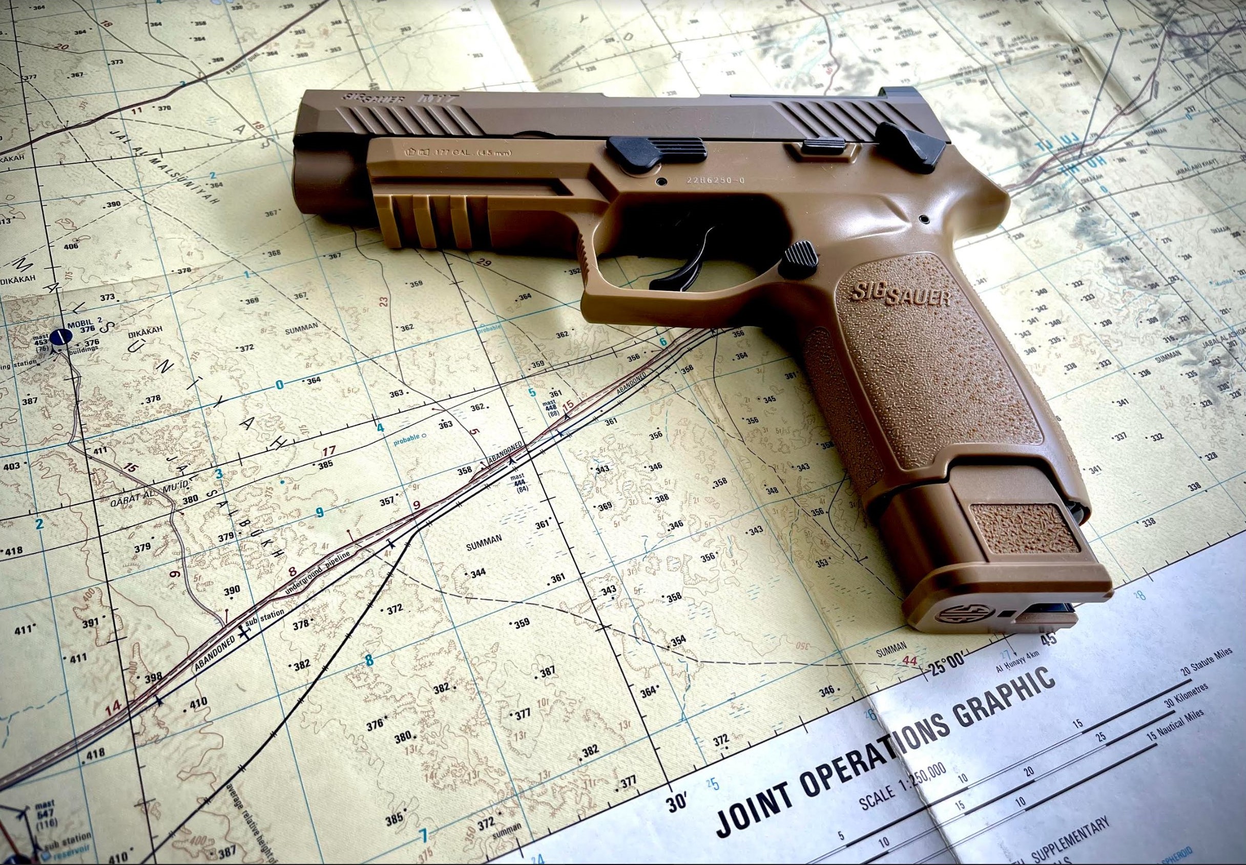 An M17 sits on a map of Saudi Arabia