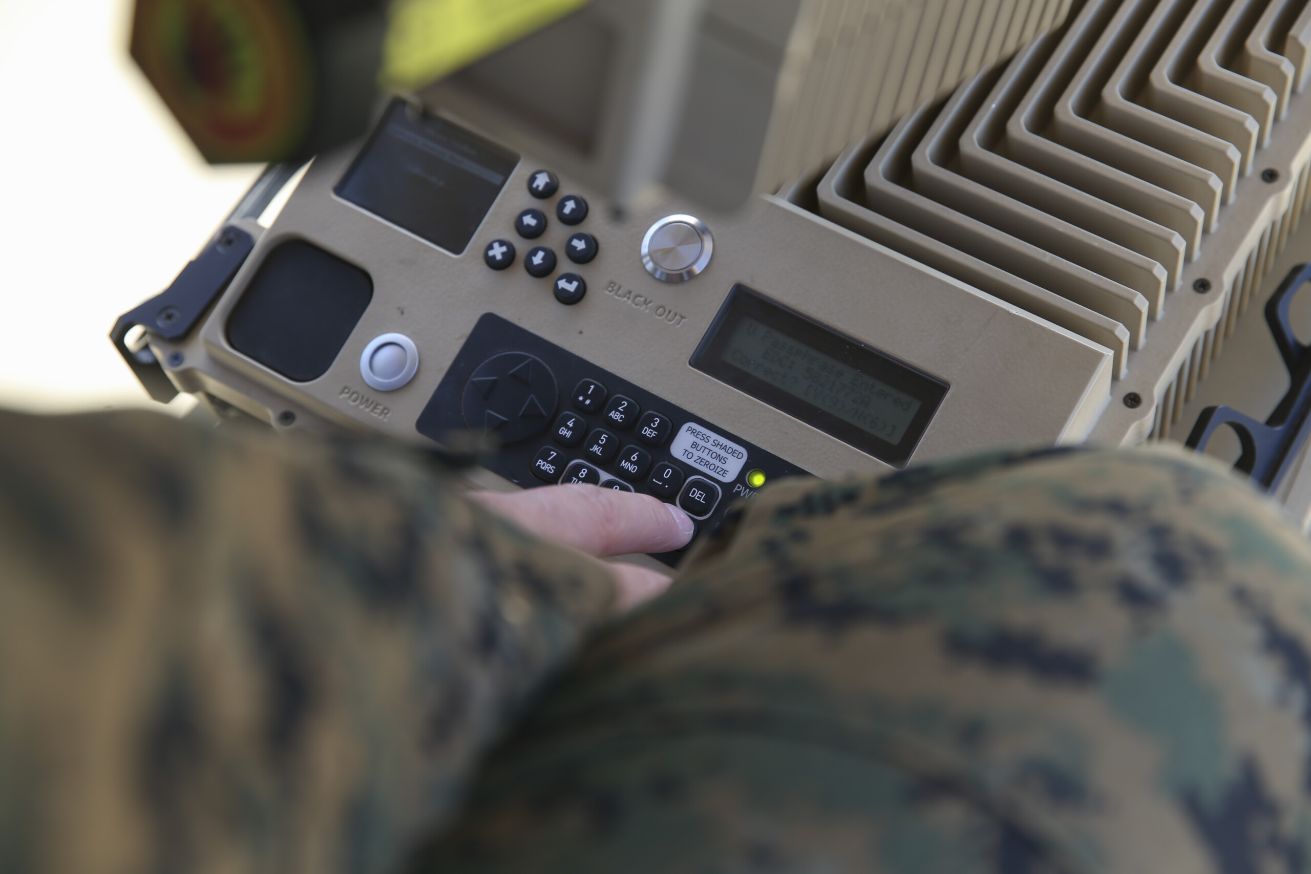 calibrates a Marine Corps wideband satellite communication expeditionary system