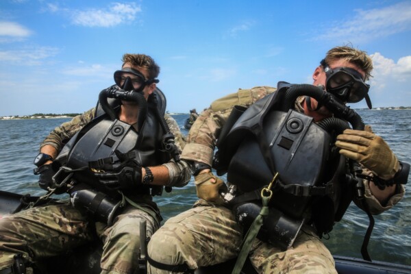 divers on a boat