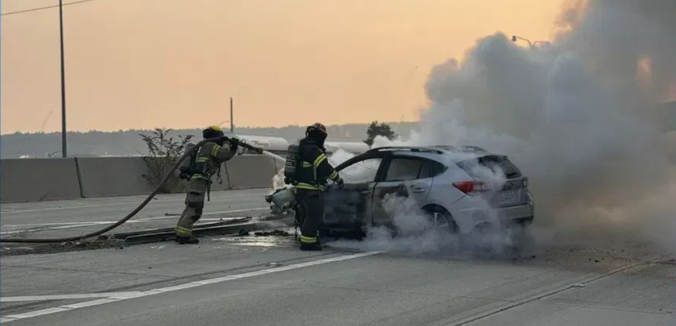 Firefighters put out the car fire on I5
