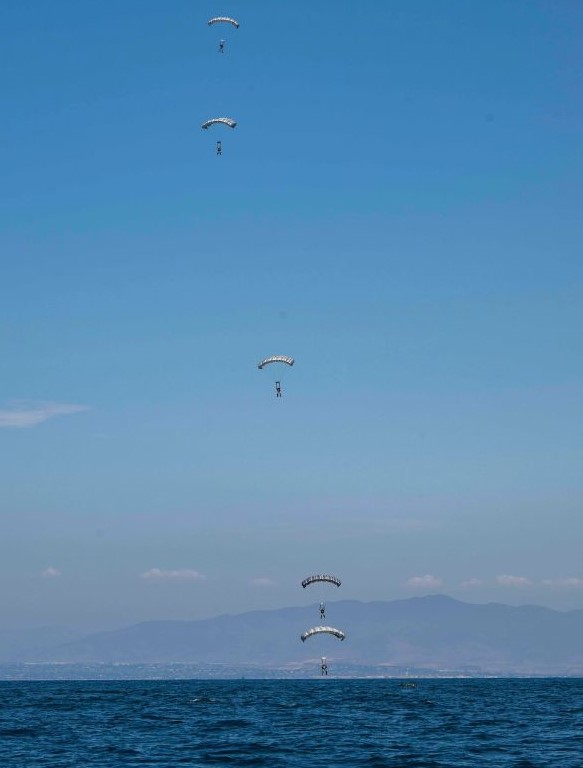 SEALs parachute in