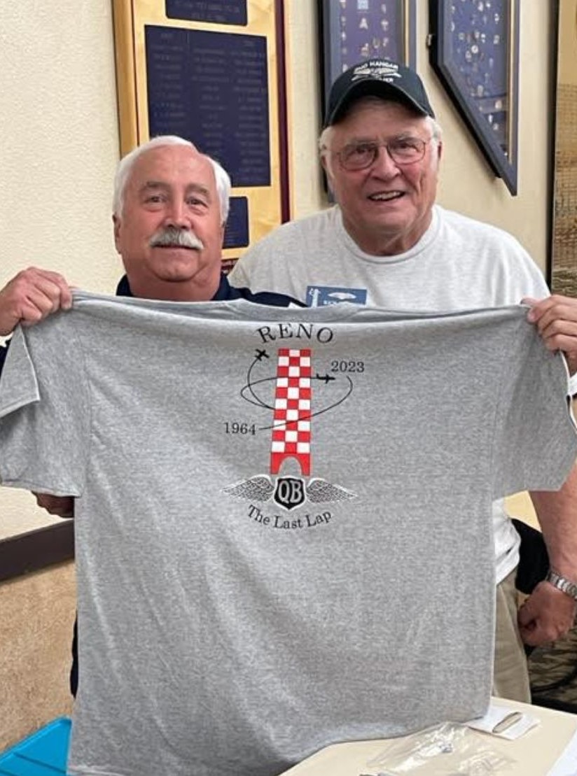 Image #6 - RNO QB’s Jim Riley and Rich Flechsig holding a T-shirt of the RNO Hangar logo with an overlay of the “Last Lap, 1964-2023”