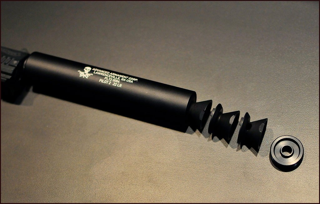 baffle suppressor mounted on pistol