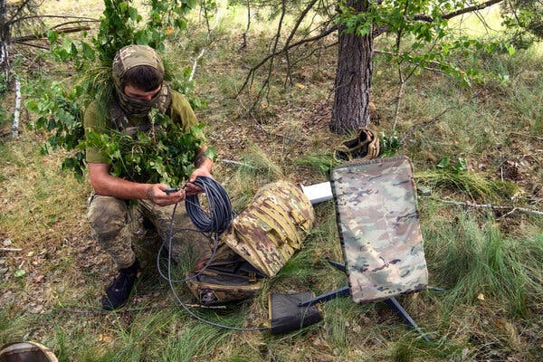 soldier sets up military communication