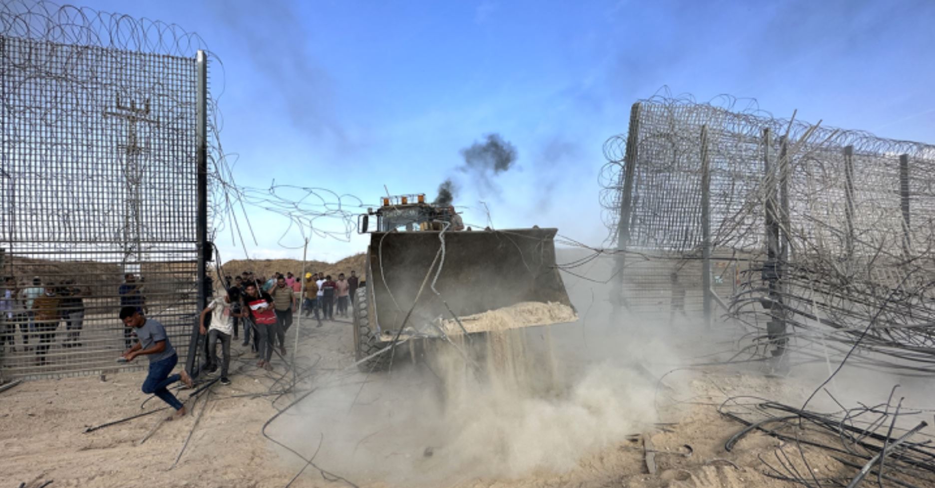 Bulldozer versus fence