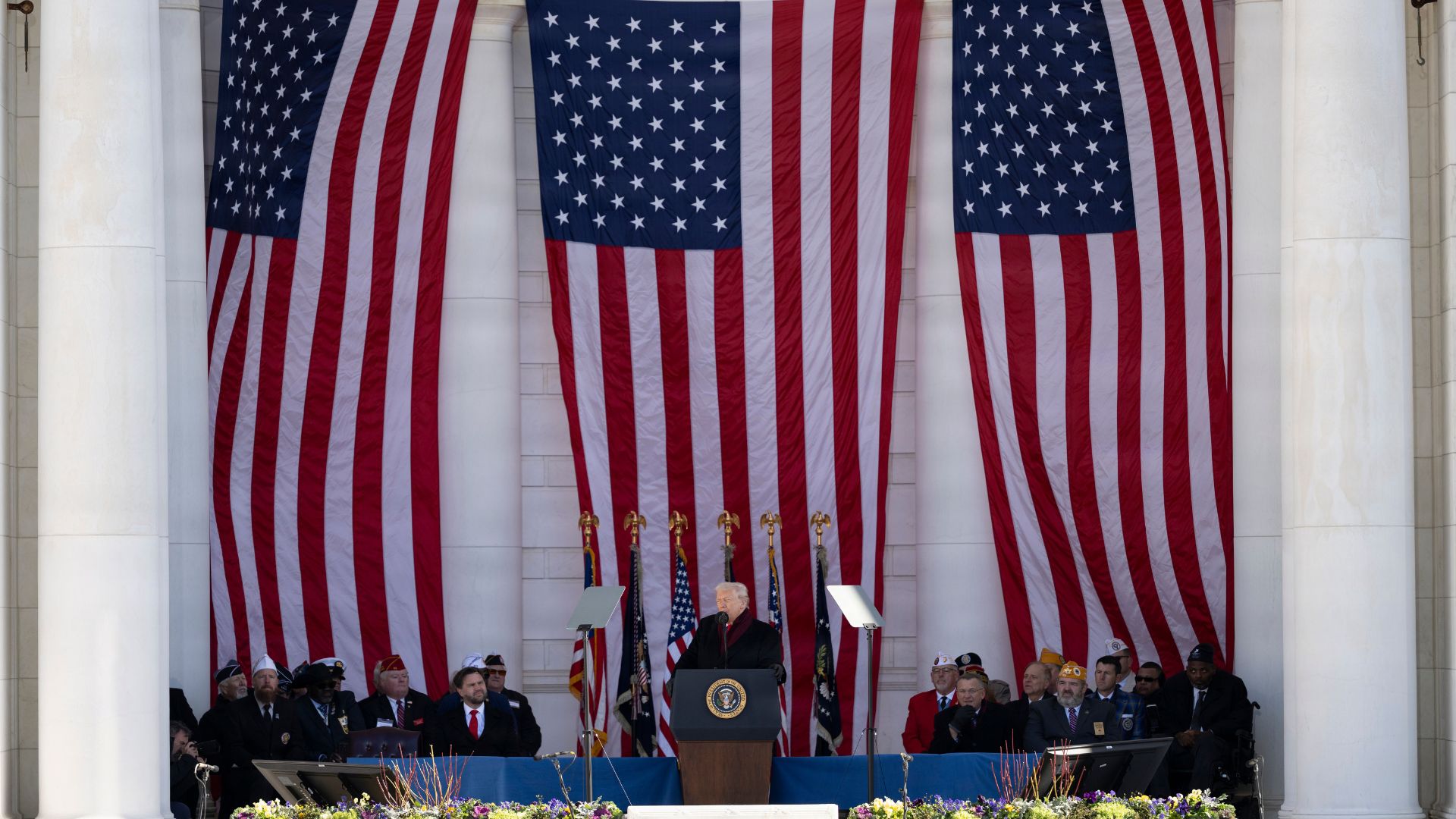 Evening Brief: Veterans Day Tribute at National Memorial, Flight Cuts Hit Airlines as Shutdown Ends, West Bank Villages Attacked by Settlers