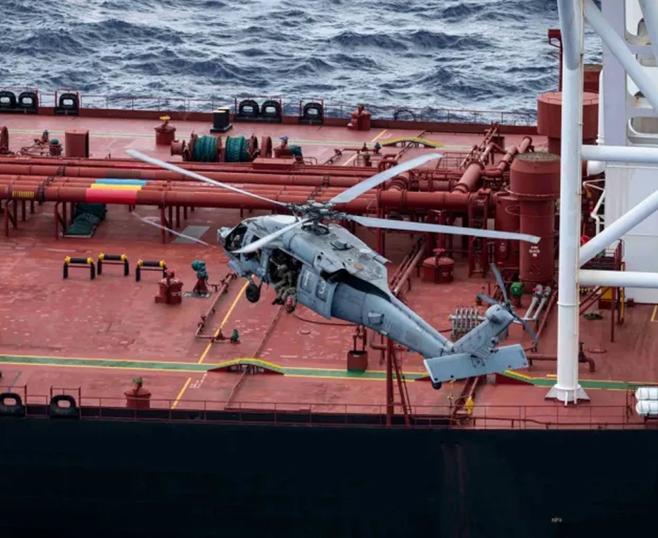 US Military helicopter boards tanker